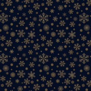 Golden snowflakes on black background