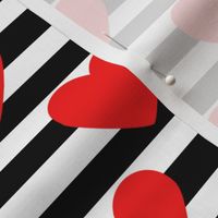 Valentine’s Day red hearts on black and white stripes