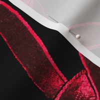 Red velvet ribbon on black