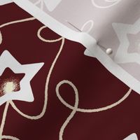 Scattered Star Christmas String Light decoration on burgundy red