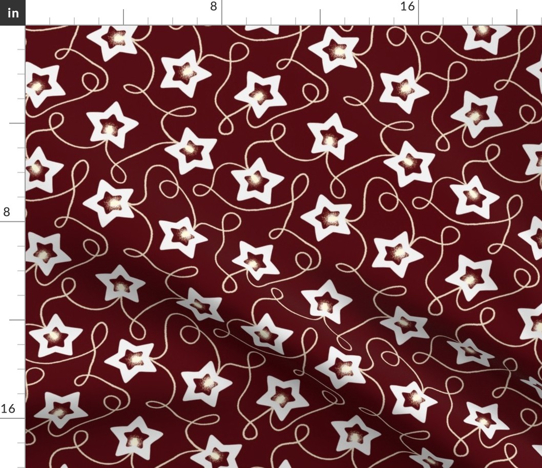 Scattered Star Christmas String Light decoration on burgundy red