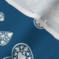 White Jewel Hearts on Blue Background