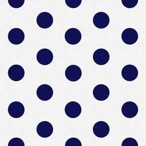 White linen background with dark blue linen polka dots