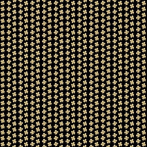 Gold glitter four leaf clover on black small