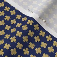 Gold four leaf clover on navy super small