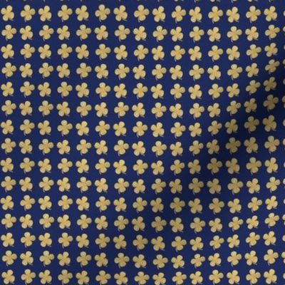 Gold four leaf clover on navy super small