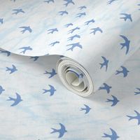 Migrate in Sky Blue | Flocks of birds, swifts, swallows, coastal decor, bird migration, flying birds, nature fabric in blue and white.