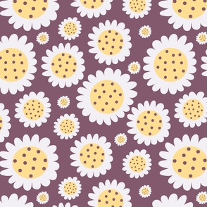 Chamomile flowers on brown background