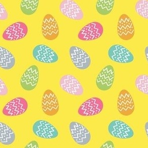 Easter eggs on yellow