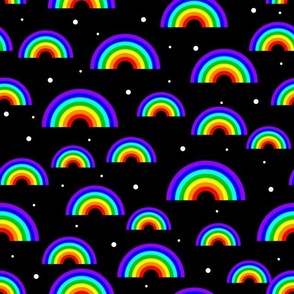 Vibrant rainbows on black space and stars background