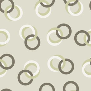 3 joined rings in olive green, light green, white on light artichoke
