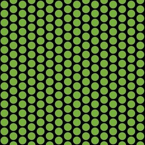 Green polka dots on a field of black