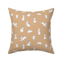 Sweet little bunny friends kids easter animals spring love design in white on orange caramel cinnamon 