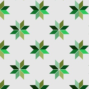 étoiles géométriques en verts sur fond blanc