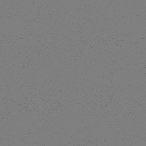 Grey background with dark grey speckles