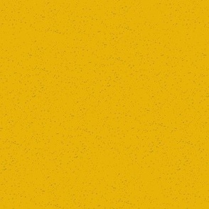 Yellow background with dark grey speckles