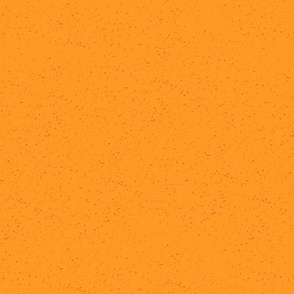 Orange background with dark grey speckles