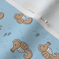 Adorable ocean seahorse and sea friends kids design freehand kawaii style minimalist caramel blue 