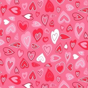 valentine hearts on a pink dotted background