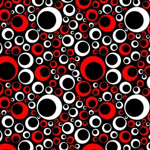 off center circles red and white on black