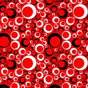 off center circles black and white on red