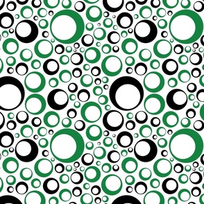 off center circles black and green on white