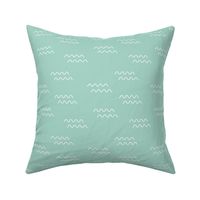 The minimalist style surf waves abstract ocean wave design white on mint green