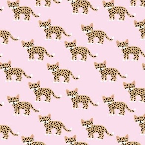 Little cheetah kawaii baby animal print minimal small speckles and spots abstract wild cat kids nursery design caramel pink dense 