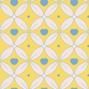 white flower with  blue heart  on yellow background