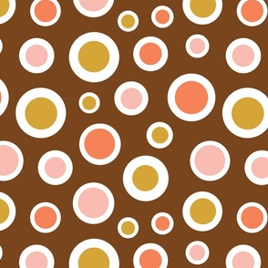 Colourful circles on brown background