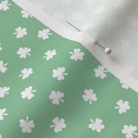 Little minimalist clovers green St Patrick's Day irish shamrock lucky charm white on mint green