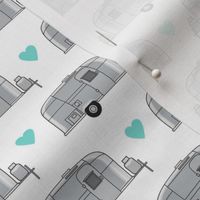 small vintage aluminum trailers with teal hearts