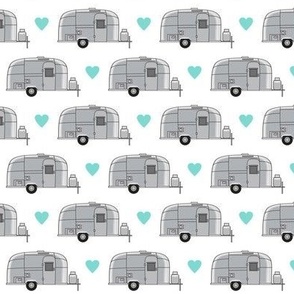 small vintage aluminum trailers with teal hearts