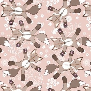 Flowery foxes on beige