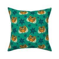 Tigers and stars on a green background