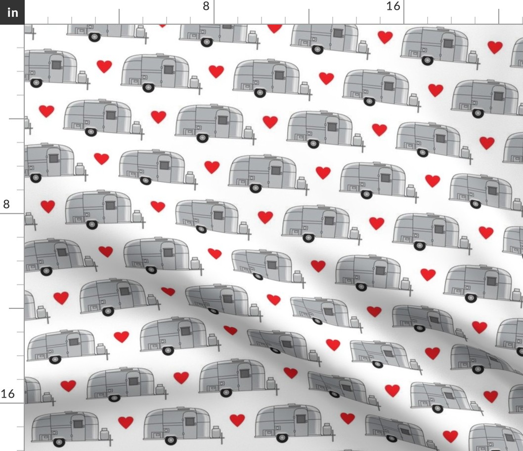 vintage aluminum trailers with red hearts