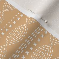 Oval boho mudcloth abstract minimalist patchwork plaid design baby nursery white on soft caramel 