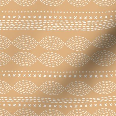 Oval boho mudcloth abstract minimalist patchwork plaid design baby nursery white on soft caramel 
