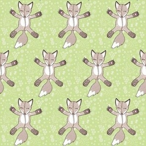 Flying flowery teddy foxes on green 
