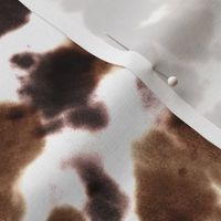 Cow tie dye pattern. Black, brown and white