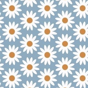 Daisies blooming on a Soothing Blue Background