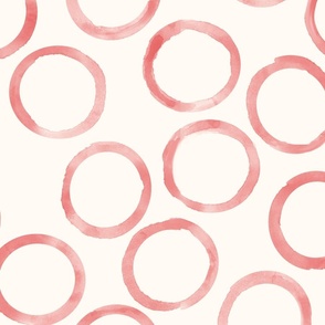 large pink circles cream background