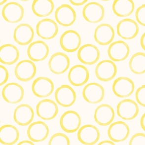 small yellow circles cream background