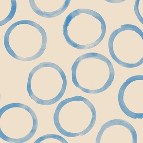 large blue circles biege background