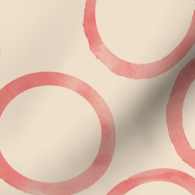 large pink circles biege background