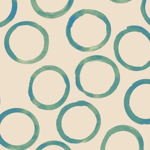 large teal circles biege background