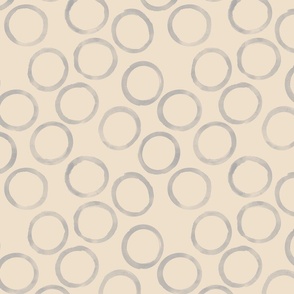 small grey circles biege background