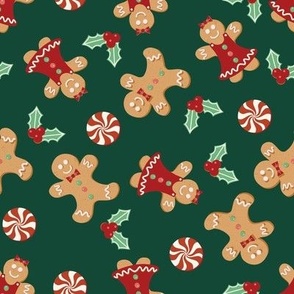 Medium Christmas Gingerbread Men and Women surrounded by Holly and Round Peppermint Candy with Green Background