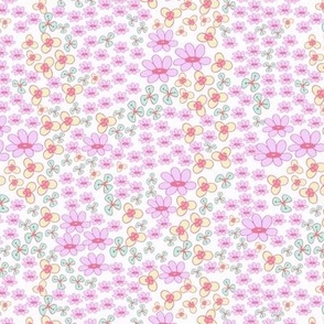 Ditsy floral in pastel pink and yellow, small scattered flowers 