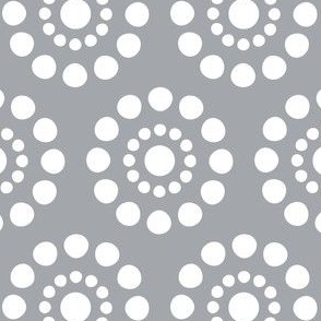 white circle flower design on gray background